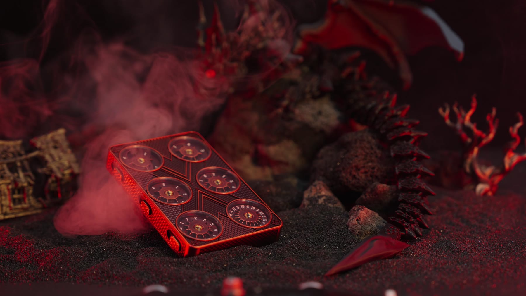 Dragon's Verdict in crimson on dark sand with a red dragon rising behind it